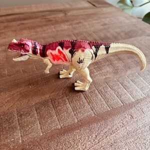 Hasbro Jurassic World Growler Ceratosaurus action figure
BATTERIES NOT INCLUDED